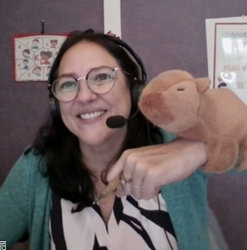 Nathalie with a capybara puppet